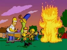 música enquanto a "bruxa malvada" queima