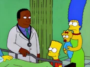 Maggie with a red bow