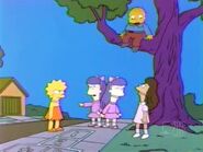 The twins are mocking Lisa.