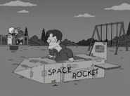 Little Jonathan playing in a schoolyard.