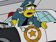 Wiggum in his police car