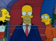 Homer talks about lobsters with a waiter.