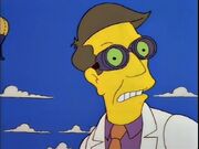 Skinner in a lab coat and goggles