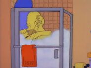 Homer kisses Marge as she hugs Homer as they shower together 😍