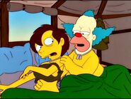 Krusty tries to keep Erin in bed with him