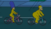 Naked Homer and Marge.
