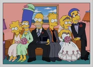 The Simpsons 15 years later. Maggie is 16, Marge is 51 and Homer is 54, Bart and Milhouse are 25, and Lisa is 23 and is married to Milhouse, albeit looks somewhat unhappy. The couch and ship painting have been replaced. 2026