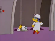 Batpoles.jpg (27 KB) Milhouse and Kirk go down poles like Batman and Robin