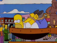 Homer is tied up and is about to be "catapulted".