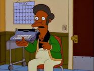 Apu taking a citizenship test