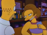 Edna attempting to seduce Homer in "Flaming Moe's" episode