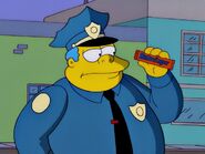 Wiggum with a Butterfinger