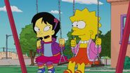 Lisa and Tumi on the swings