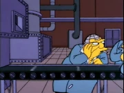 Part of the worker's jacket collar is white