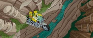 Bart and Homer jumping the gorge.