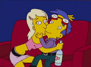 Paris kisses Milhouse.