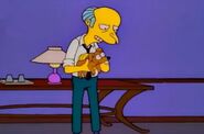 Mr. Burns carrying Little Monty