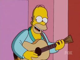 Homer playing the guitar