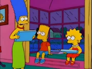 The board games in front of Bart's arm