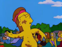 young Homer playing in the mud