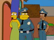 Marge is arrested (again) for discovering the scheme of expired prescription drugs