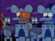 The robot's eye shining through the mallet