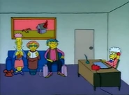 The woman from Rubber Baby Buggy Bumpers Babysitting Service talks.