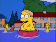 Martin wearing seventeen layers of swim trunks