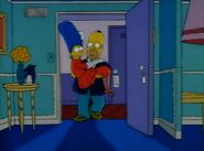 Homer bringing Marge into the hotel room.