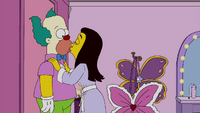 Penelope kisses Krusty for the first time.