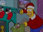 Homer stealing all the Nahasapeemapetilon family's presents.