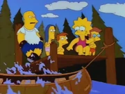 Wearing her pink bathing suit.