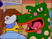 The monster costume missing its top teeth