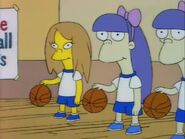 Terri and her sister at their school's gym