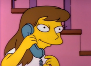 Laura prank calling Moe's Tavern with the help of Bart.