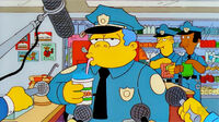 Chief Wiggum drinking a Squishee