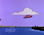 Homer escapes onto a garbage barge.