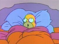 Homer na cama