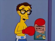 Woody Allen holding a Fujikawa rice cracker box