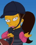 Tessa Rose riding a pony