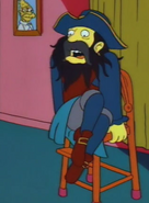 Sitting in Maggie's high chair