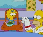 Homer plays with Maggie