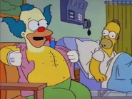 Krusty shows Homer his pacemaker.