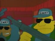 The S.W.A.T. team invading Krusty's apartment.