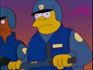 Wiggum in a different police uniform