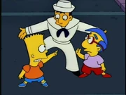 The skin above his shirt collar is colored like his clothes