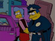 Wiggum arresting Mona Simpson