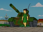 Madam Wu shows up with a tank.