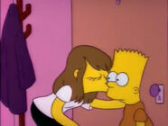 Laura kisses Bart in the cheek