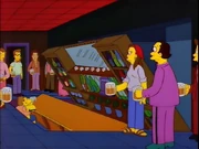 The bottle between the green bottle and the cash register is not colored in